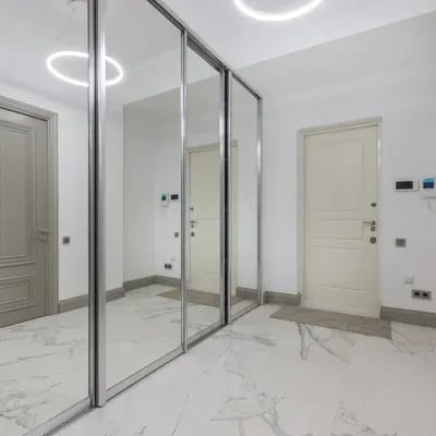 Spacious hallway with bright colors and a beige floor