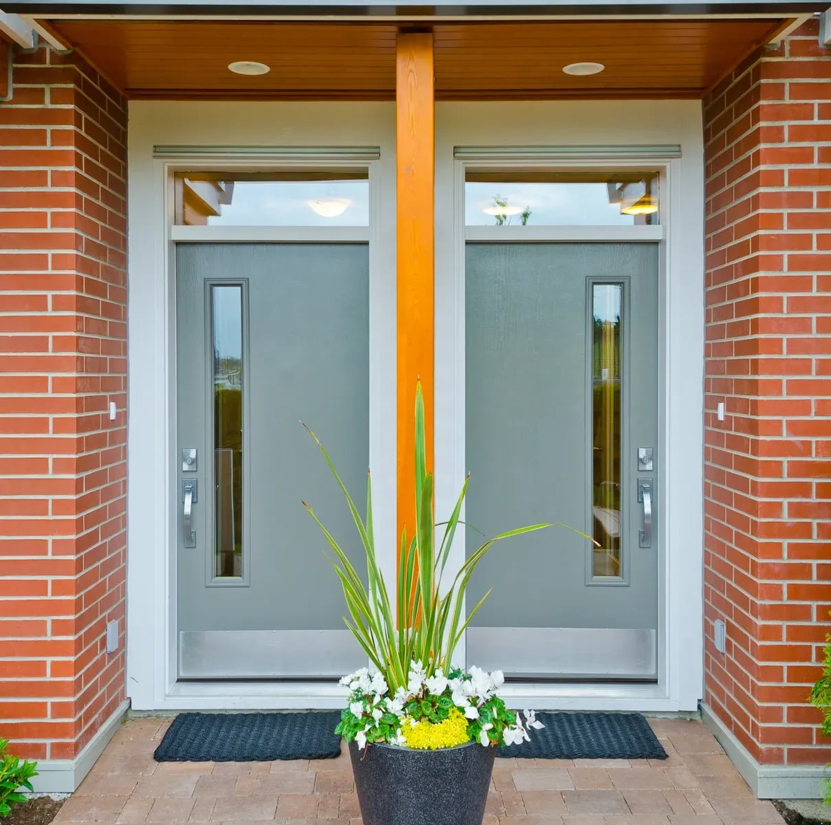Entrance of a home with a custom fiberglass door installation