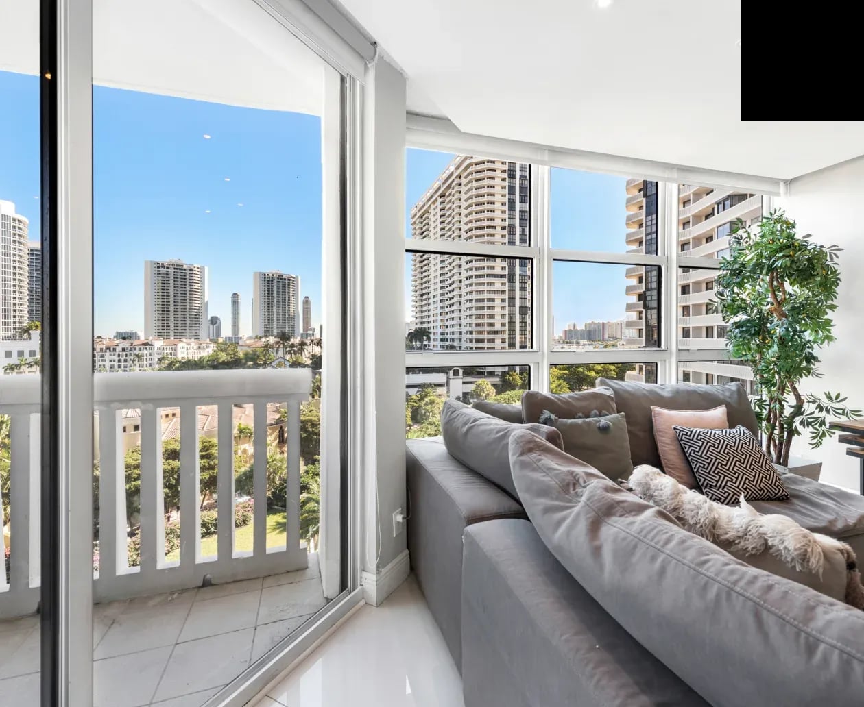 High-rise condo interior with floor-to-ceiling impact glass
