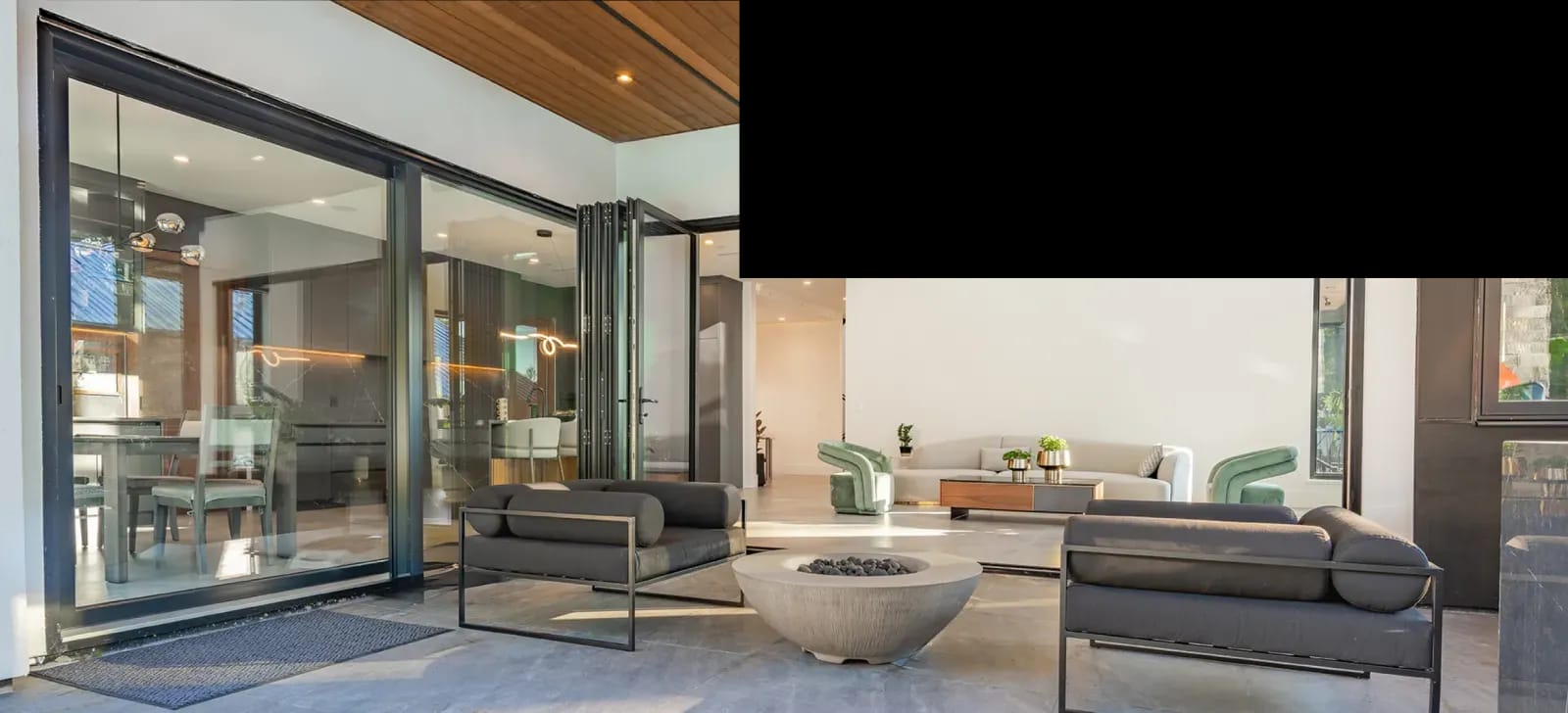 Open-plan Miami interior with folding impact glass doors to the patio