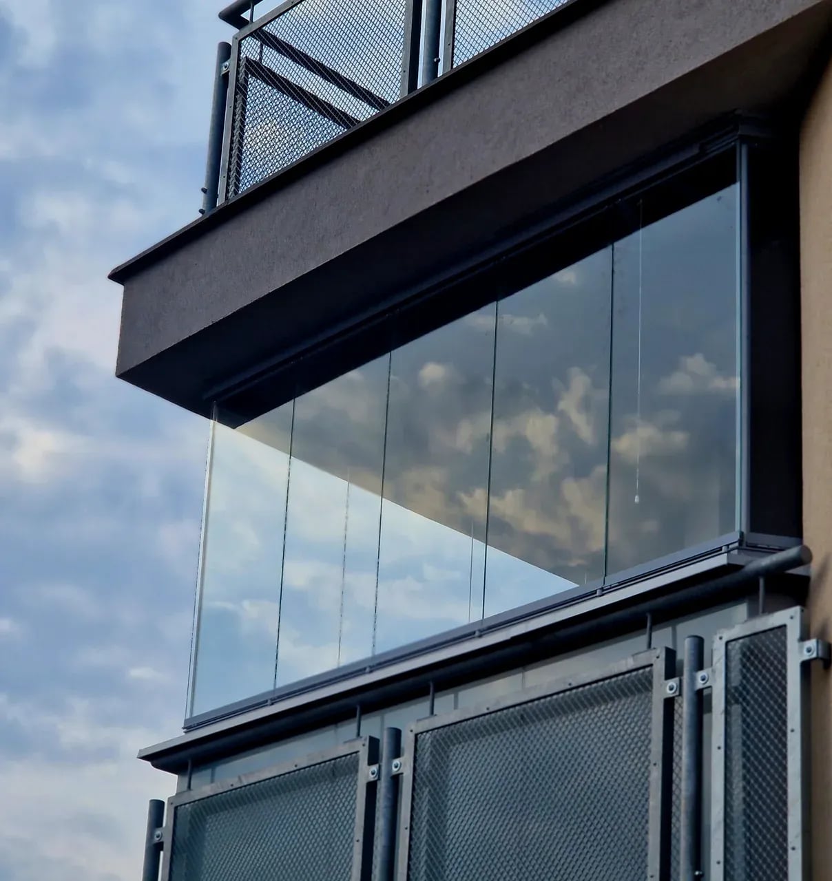 Frameless balcony glazing on a modern sleek system